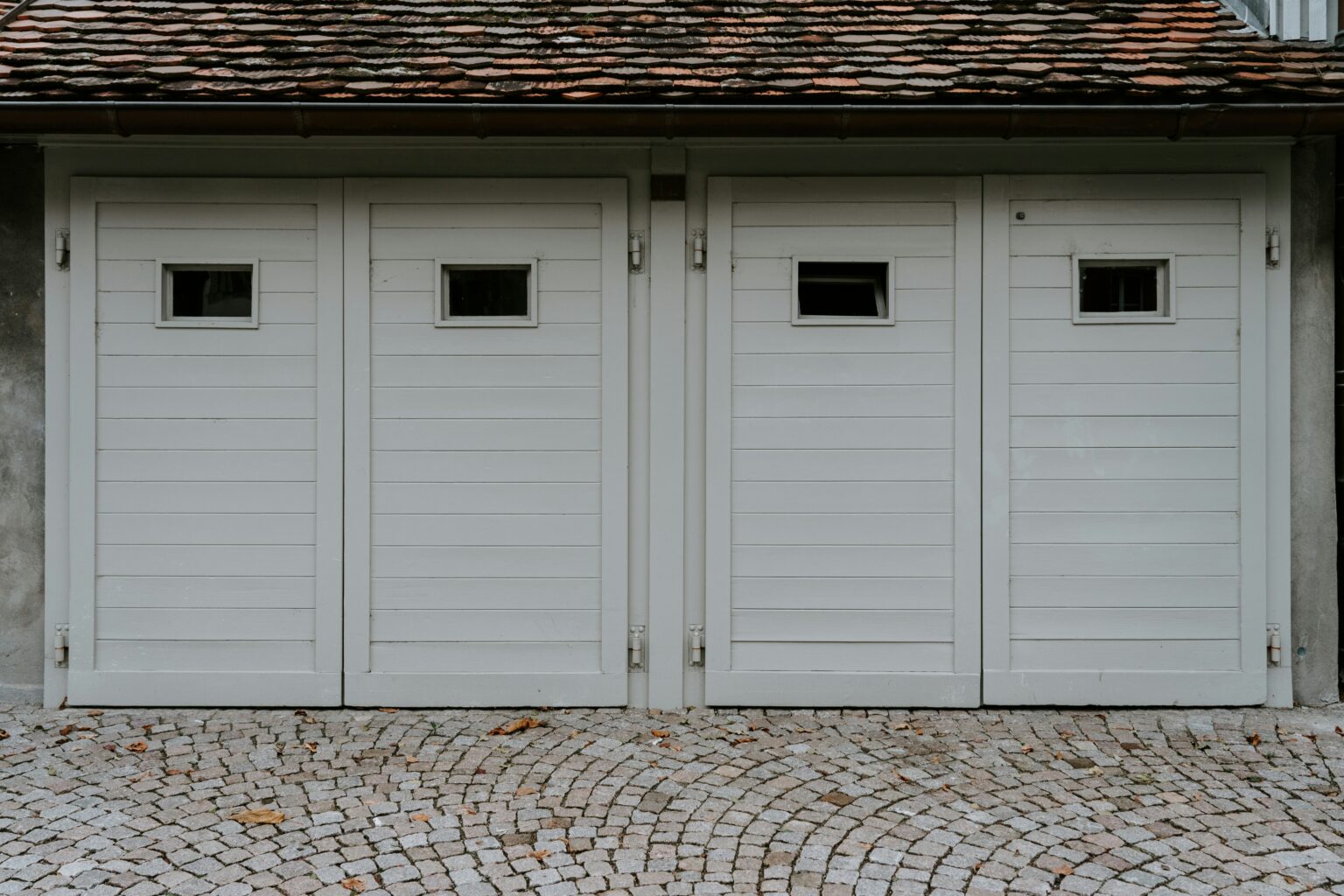 Wide multi-bay garage doors on a property in Whatcom County, Washington
